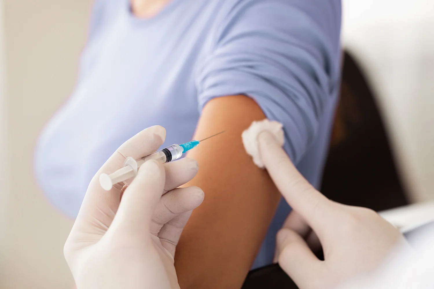 male doctor doing vaccination