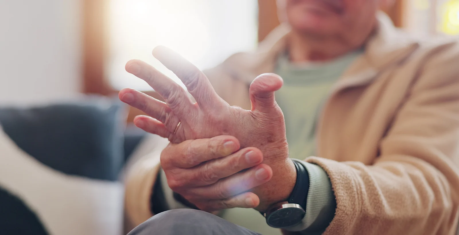 closeup hands and senior man