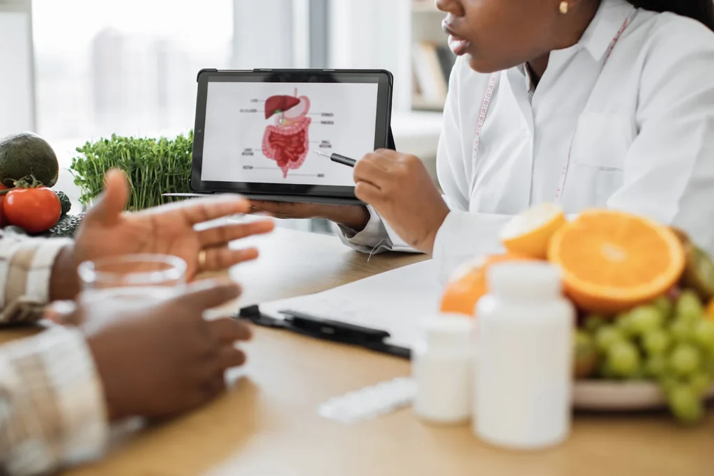 lady with device analyzing gi treatment